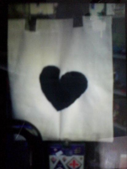 black heart on a small handbag